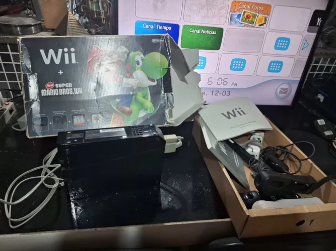 Video gamer wii .nao sei se esta funcionando e nem como funciona vendo no estado que esta