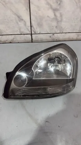 Farol esquerdo Tucson 2009 a 2015