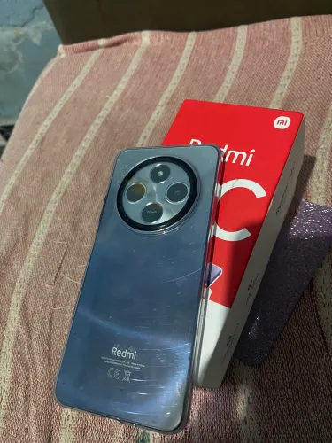 Redmi 14 C tem 256 gb tem duas capinha película de privacidade 8 de ram na azul tá caixa