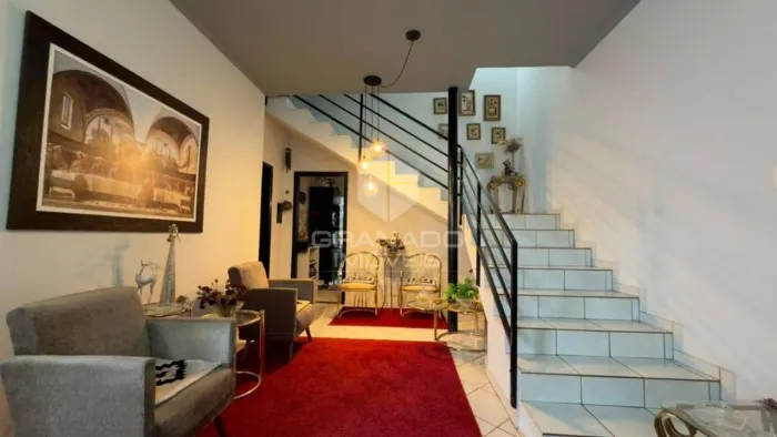 Sobrado com 3 dormitórios à venda, 119 m² por R$ 550.000,00 - Vila Marumby - Maringá/PR