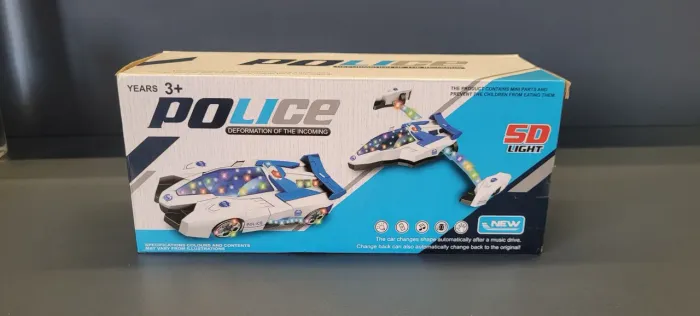 Carrinho de polícia que vira nave e acende luz a pilha Novo