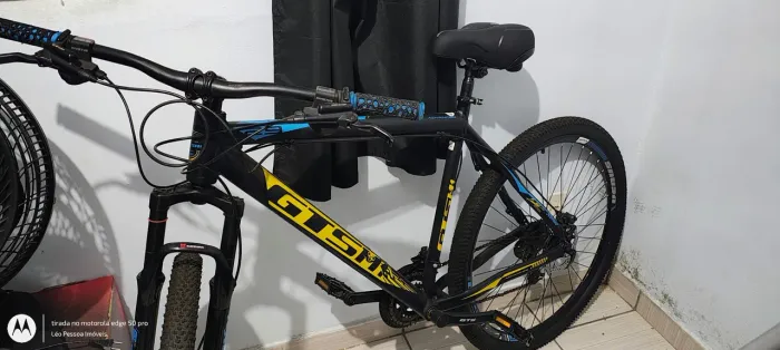 Bike 21 marchas, aro 29" quadro 21" GTSM1 freio a disco hidráulico e banco em Gel.