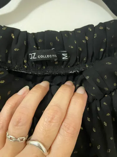 Saia longa preta com Poás Dourados DZ Collection | Tamanho M