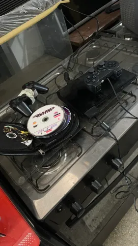 Playstation 2 completo leito funcionando com mais de 20 Cd de jogos