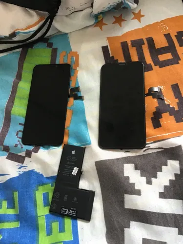 Bateria xs nova e 2 tela incel novas xs