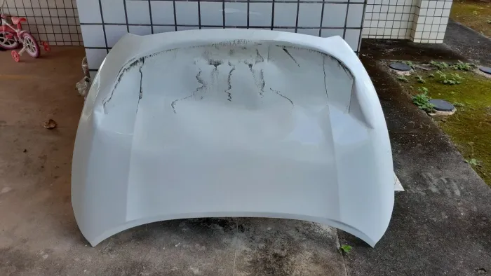 Capô Nissan Kicks avariado