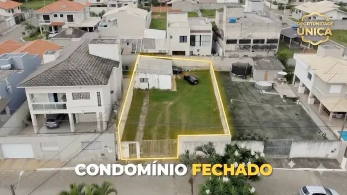 Lote com casa simples