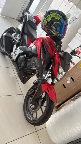 Vendo ou troco moto semi nova TEl *