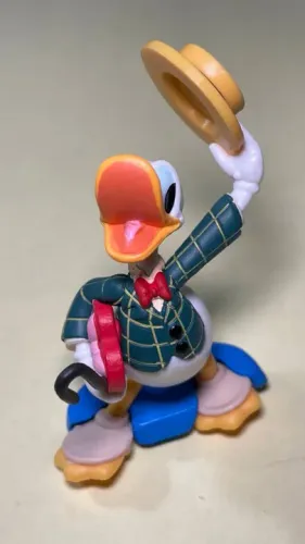 Pato Donald mini altura 5 cm (desenho Mr. Duck Steps Out) p/ fãs Disney Abril Culturama
