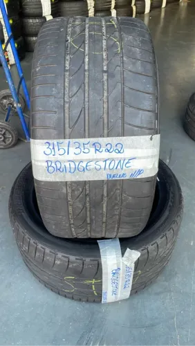 Pneu Bridgestone Dueler H/P 315/35R21 meia vida 2 pneus