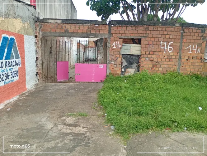 Vendo terreno no marivam 2x25 com três casas
