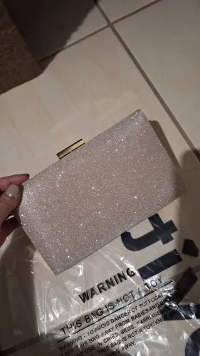 Bolsa clutch com brilho rosa nude