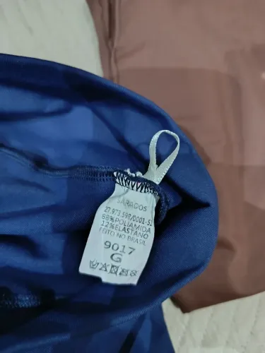 Calça Leggin tamanho G, azul com bolso na lateral da Sarados