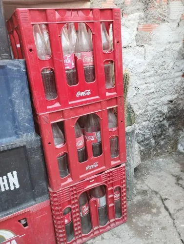 Caixa coca com vasilhames