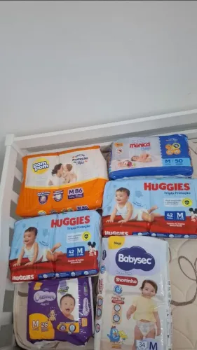Vendo 6 Pacotes de fraldas tamanho M