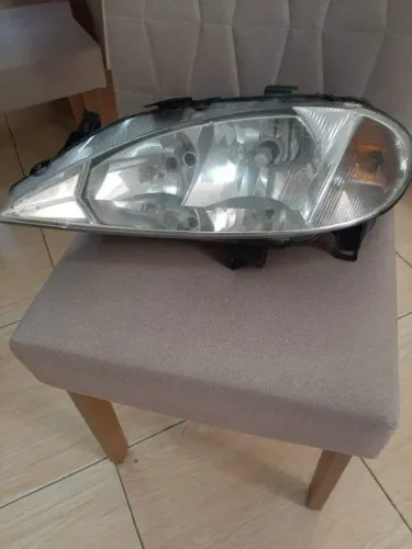 Farol esquerdo original Megane ano 2003