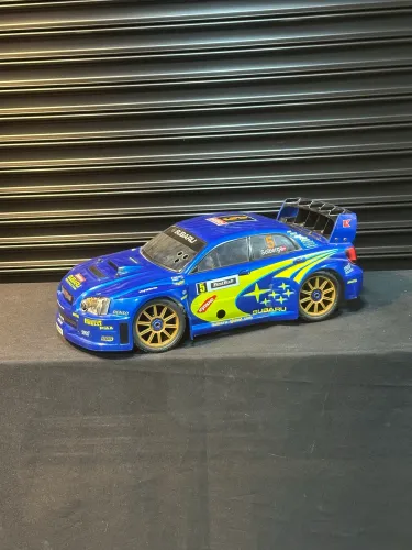 Automodelo Kyosho GT1 1/8 Subaru 