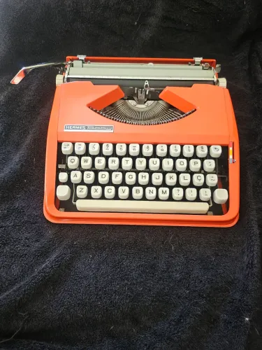 Maquina de datilografia Olivetti baby