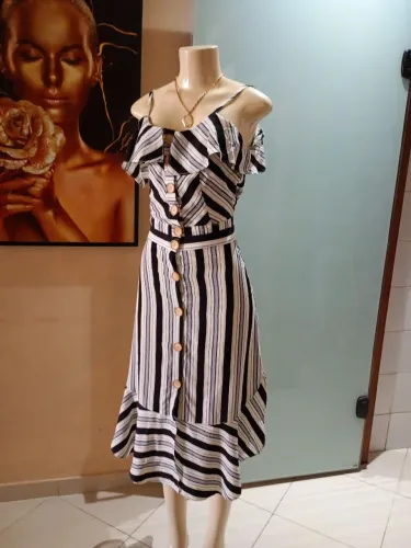 Conjunto em tecido com Lycra p... semi-novo.. botões funcional..