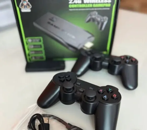 Videogame Stick 4K 64gb 2 Controles Sem Fio Console Portatil Jogos Retro Antigo