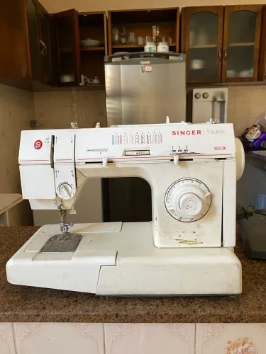 Máquina singer caseira 