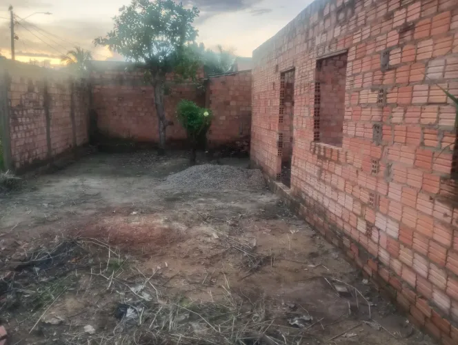 Vendo terreno com construção