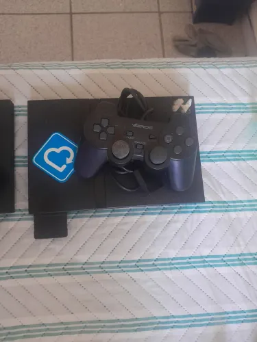 Vendo 2 ps2 com 4 controle funcionando perfeitamente 