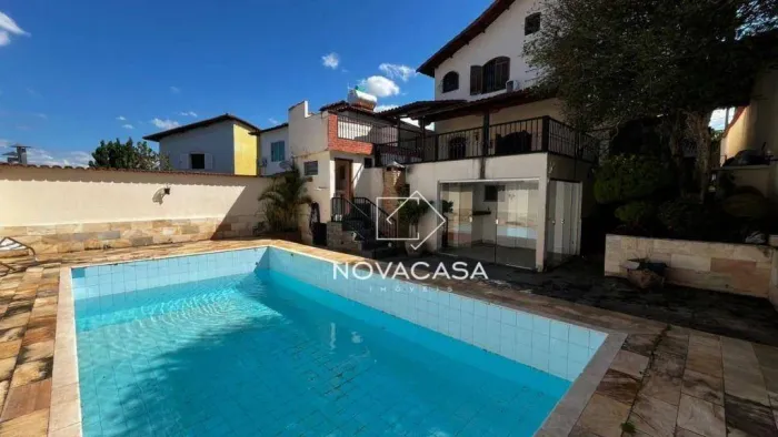 Casa com 4 dormitórios para alugar, 345 m² por R$ 8.983,69/mês - Planalto - Belo Horizonte