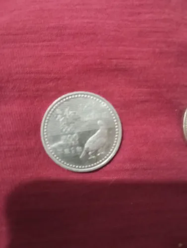 Moedas com defeito e antiga