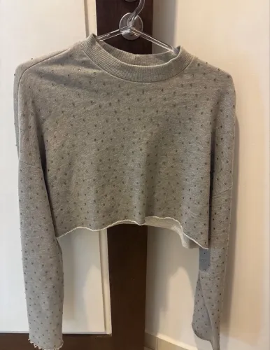 Casaco cropped com brilho da marca Colcci