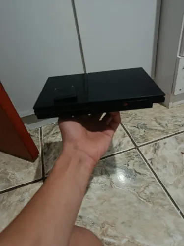 PS2 com memory card 8mb e cabos ok , só está sem controle