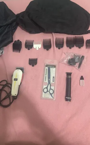Máquina de cortar cabelo e acessórios