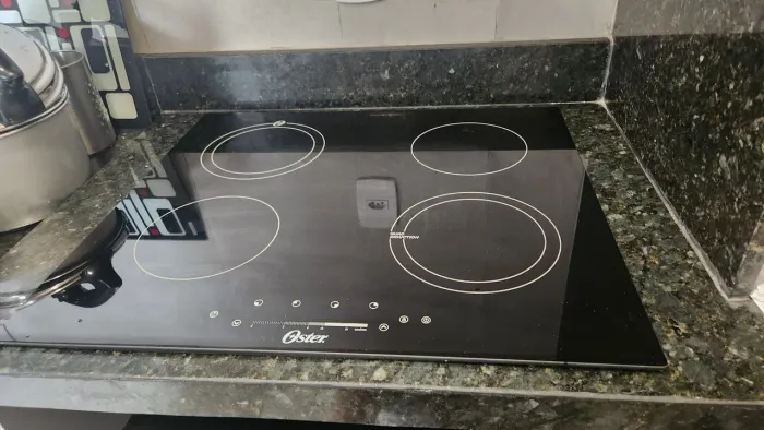Cooktop Indução 4 Bocas Oster Touch Screen - 220V<br>