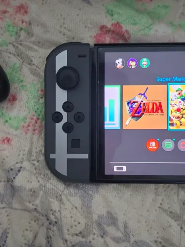 Switch Oled Desbloqueado versão Smash Bros com original intacto