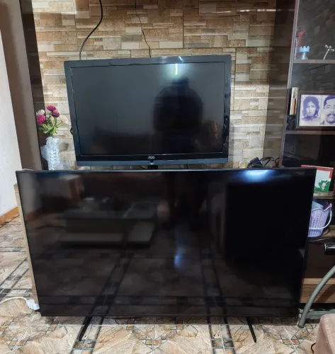 Smart tv Samsung 55" com plástico nas bordas, só pegar e assistir os jogos. 1 ano de uso