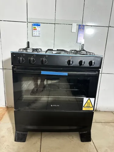 Vendo fogão Atlas 5 bocas , acendedor automático, novo .