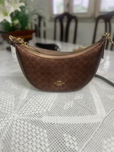 Bolsa Coach, original, bronze metálico.