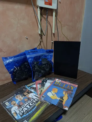 PS2 slim com leitor