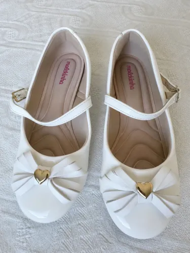 Sapatilhas estilo boneca.