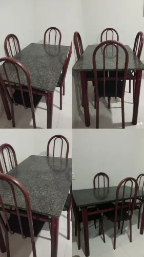 Mesa de mármore e cadeiras