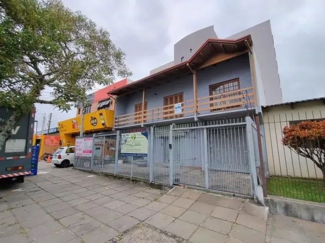 Cod.imóvel: 402 - Prédio comercial no Bairro CAMAQUA com 242 m2, 2 dormitórios, Área de se