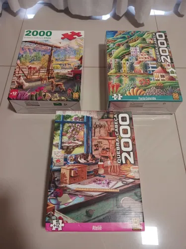 3 - Quebra-cabeças 2000 peças (1 lacrado)