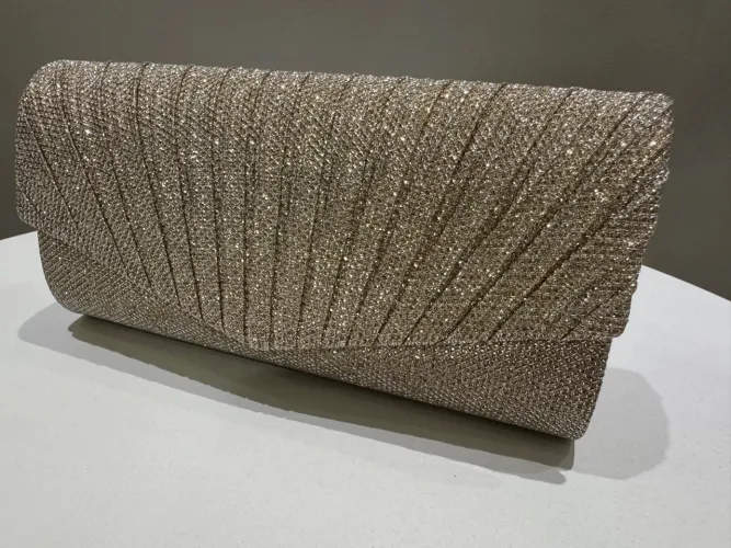 Bolsa de mão Clutch dourada com brilho