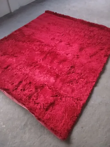 Tapete felpudo vermelho já lavado