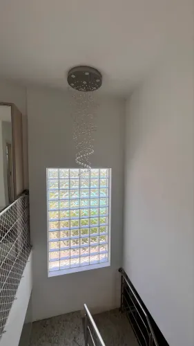 Lustre em cristal k9 com acabamento em inox