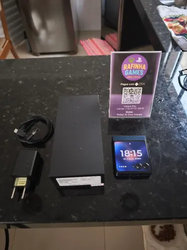 Motorola razy 60 256 GG troco por vídeo game mais volta 