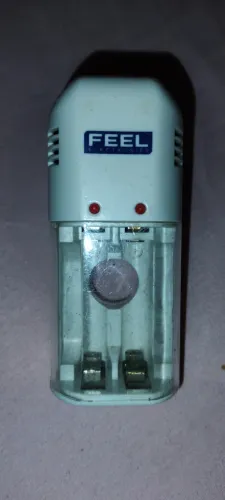 Carregador de pilha média e palito