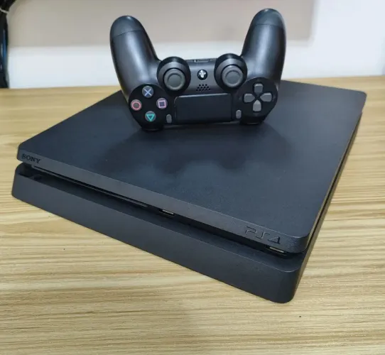 Playstation 4 + Controle e jogos
