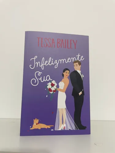 Livro Infelizmente Sua - Tessa Bailey
