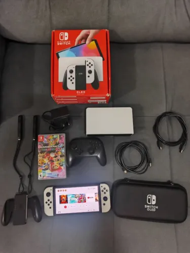 Nintendo Switch OLED completo + Pro Controller + Mario Kart + 128GB
